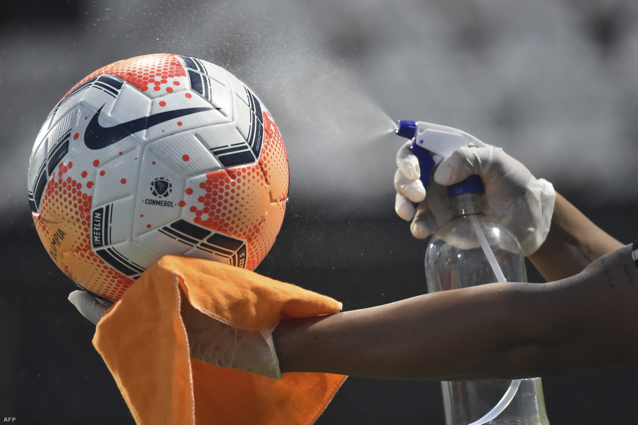 In soccer balls are disinfected before and during matches.  Pictured is the ball being handled prior to the Paraguay Olympics and the Ecuadorian dolphin clash.