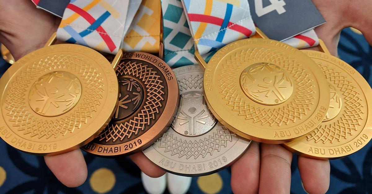 The Olympic Games in which we collected at least one coin in every sport