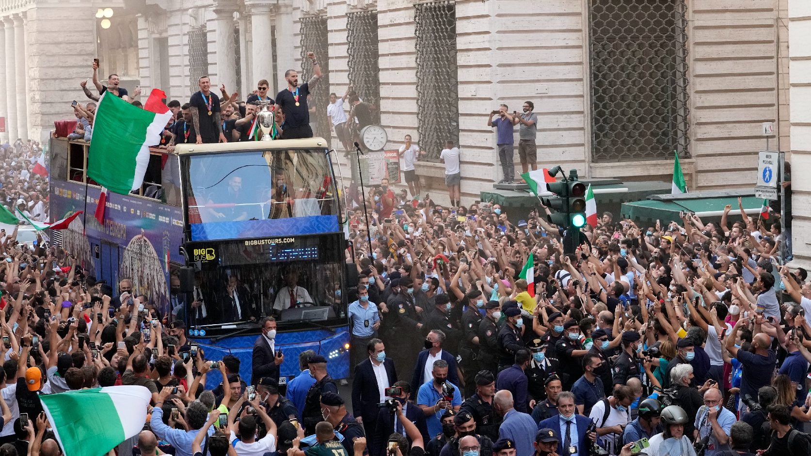 They fenced the bus too!  Hundreds gathered to celebrate the Italian national team