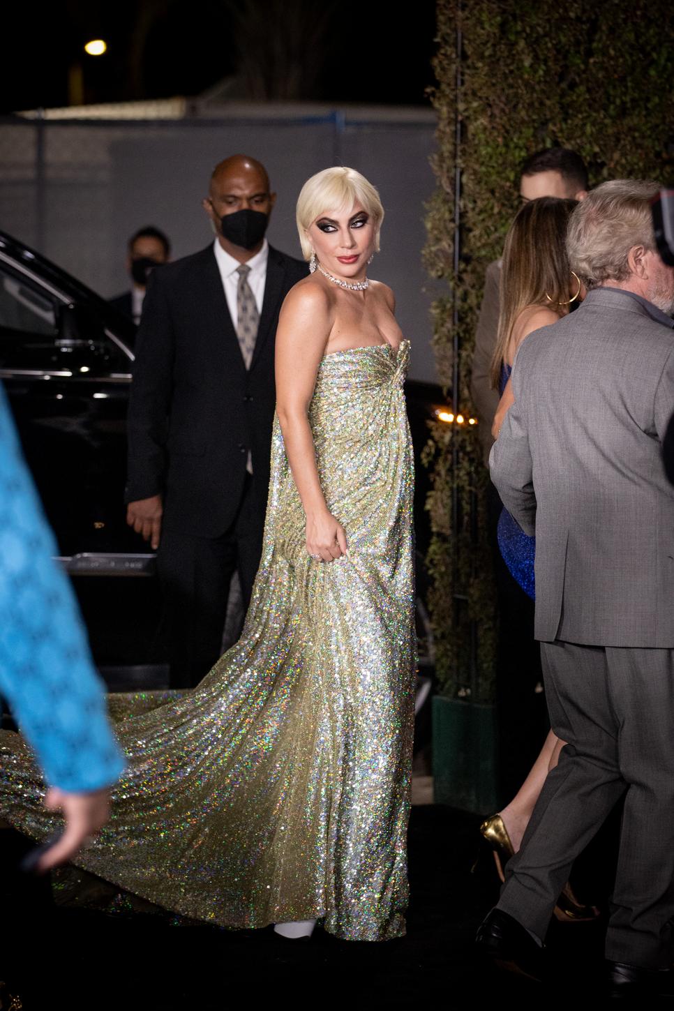 What a transformation!  Lady Gaga arrives at the premiere of The Gucci House with super short hair and extra makeup