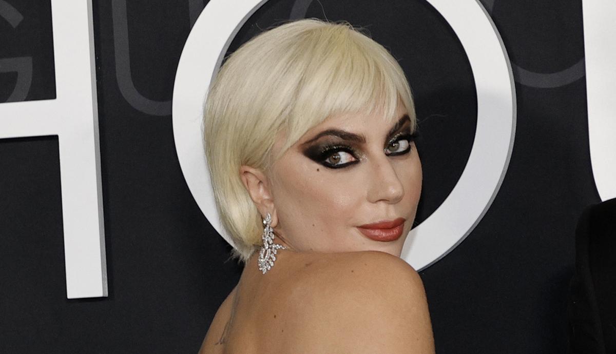 What a transformation!  Lady Gaga arrives at the premiere of The Gucci House with super short hair and extra makeup