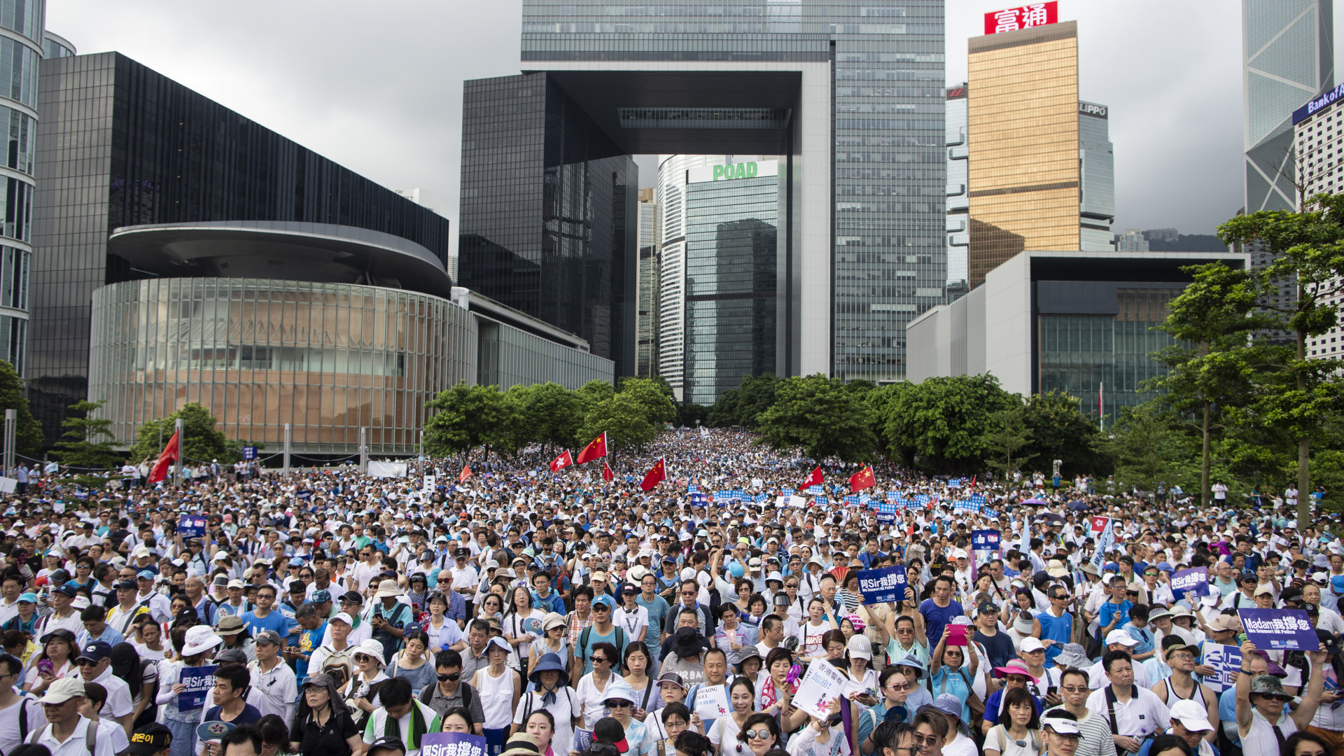 Tens of thousands of Hong Kong residents flee Beijing - but the western capital is holding on