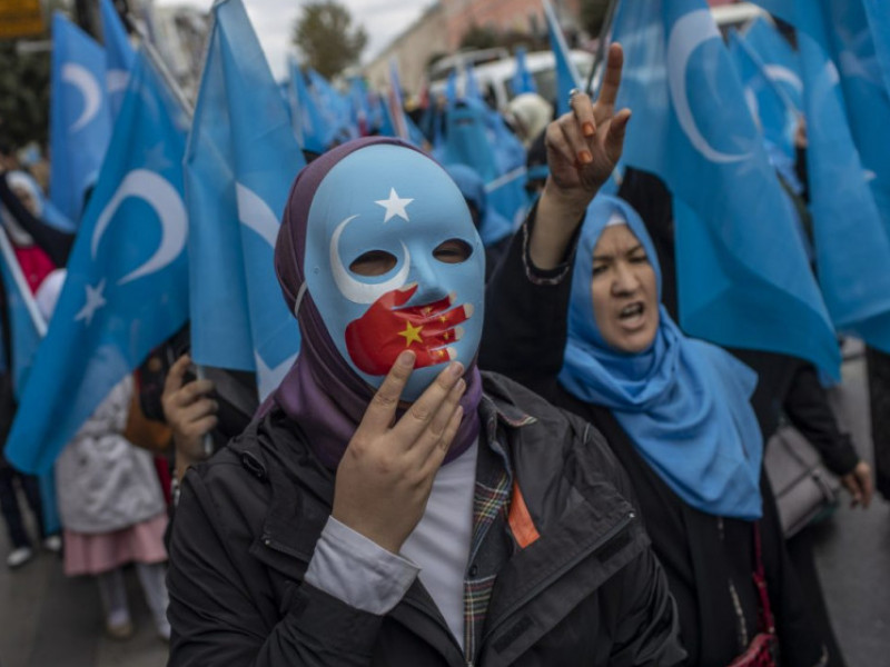 ujgur tüntetés kína