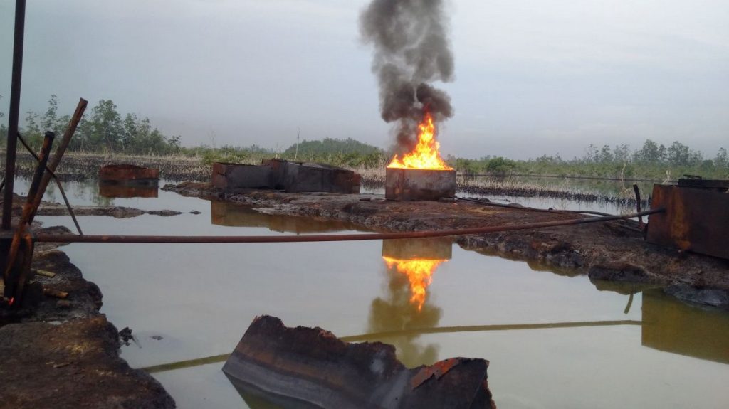 An illegal oil refinery exploded, killing more than a hundred people