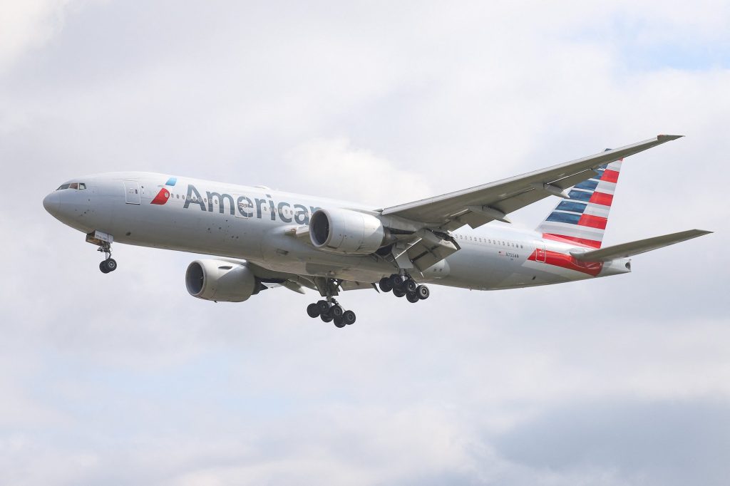 Two American passengers received the highest fines ever for attempting to open a plane door during the flight