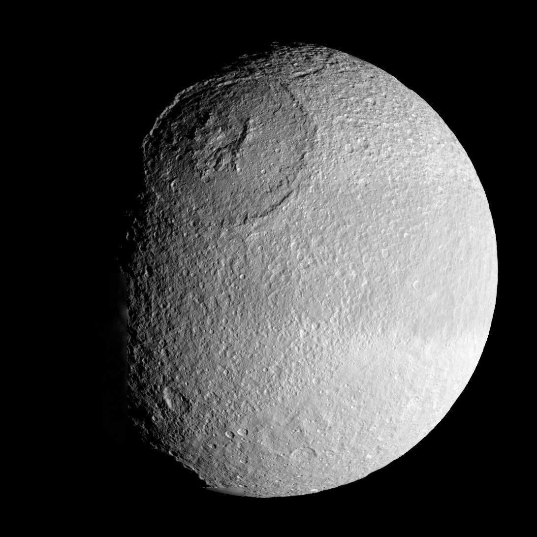 What do the elongated craters on Saturn's moons tell us?